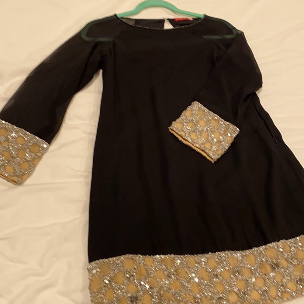 Tunic with gold embellishments